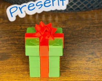 Present Clicker – Giocattolo natalizio irrequieto