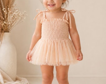 Robe barboteuse en tulle pêche clair 2T