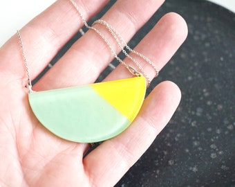 Minimalist statement necklace made from mint green and yellow fused glass and sterling silver