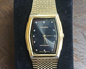 men's vintage orient quartz watch b05jw2-40 cs