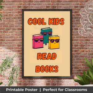 May include: A framed poster with the text "COOL KIDS READ BOOKS" in orange. The poster features three cartoon books wearing sunglasses in pink, green, and yellow. The background is a light beige color.