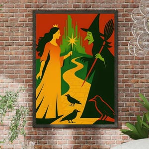 May include: A framed art print featuring a stylized illustration from The Wizard of Oz. The artwork depicts the good witch and the wicked witch, with a yellow brick road leading to the Emerald City. Black crows are at the bottom of the image. The color palette includes orange, green, and yellow.