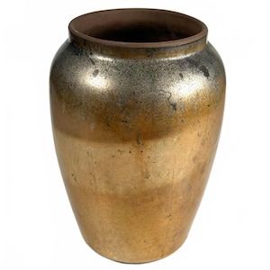 May include: A vintage, metallic gold-colored ceramic jar with a wide opening and a dark brown rim. The jar has a rounded body and a slightly tapered base. The surface has a mottled appearance, with variations in color and texture.