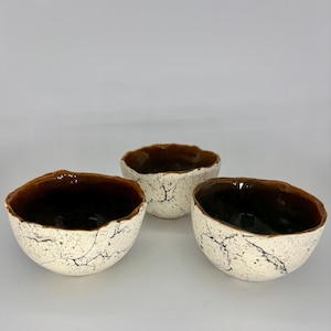 peaceful, serene textured white clay bowls, made in Vermont without a wheel; subtle textures with contrasting glossy interior glaze