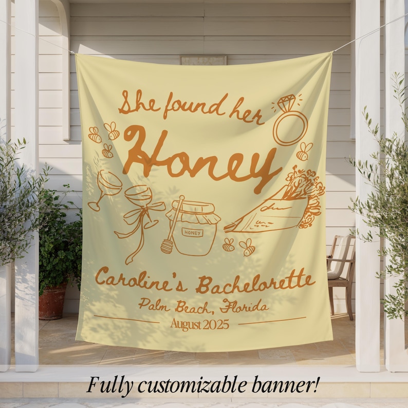 May include: A light yellow banner with brown text and illustrations. The banner reads "She found her Honey" with images of bees, a ring, wine glasses, and a honey pot. It also says "Caroline's Bachelorette, Palm Beach, Florida, August 2025".