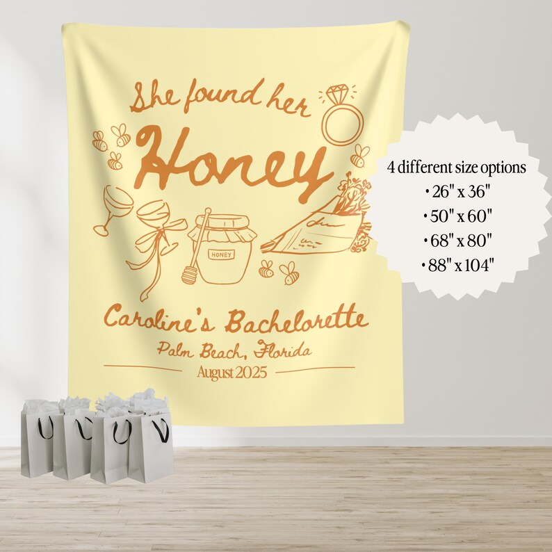 May include: A light yellow bachelorette party tapestry with the text "She found her Honey" and "Caroline's Bachelorette, Palm Beach, Florida, August 2025". The design includes illustrations of a ring, bees, wine glasses, and a honey pot. Four size options are listed.