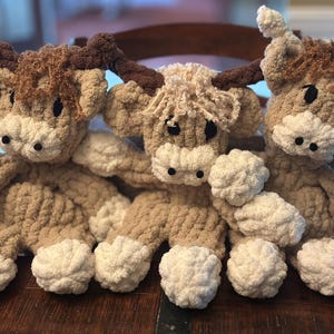 Cozy, hand-knit plushies.    Made to order