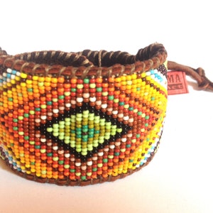 Ojo de Dios Eye of God Bracelet Cuff on Chocolate Deer Hide