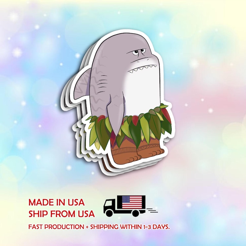May include: A sticker featuring a cartoon shark with a stern expression. The shark is gray and white, wearing a green and brown skirt and boots. The text "MADE IN USA" and "SHIP FROM USA" are visible, along with a truck graphic.
