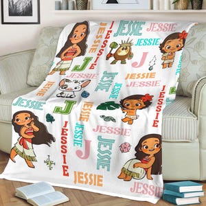 May include: A white blanket with cartoon characters and the name "Jessie" in different colours and fonts. The blanket features illustrations of a girl with long brown hair, a pig, and other tropical-themed images. The word "Jessie" is repeated throughout.