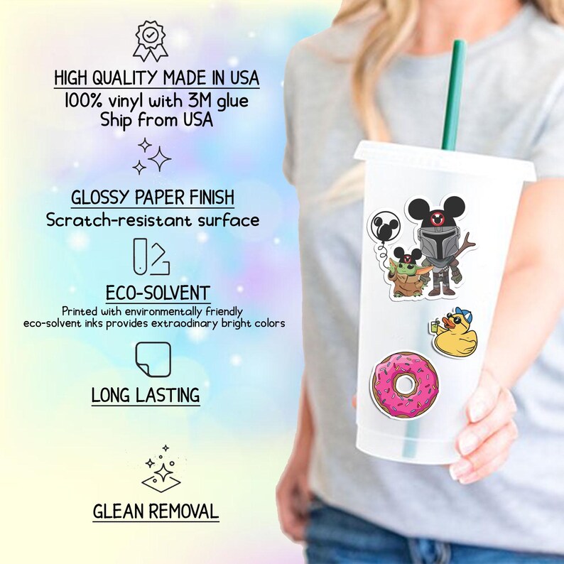May include: A clear plastic tumbler with a green straw featuring vinyl stickers of a character in armor with mouse ears, a small green creature, a yellow rubber duck, and a pink frosted donut with sprinkles. Text details product quality.