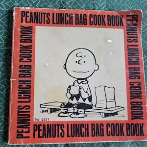 Peanuts Lunch Bag Cookbook book Charlie Brown Charles Schulz 1974 small softcover