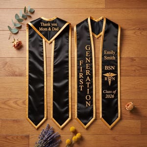 May include: Black graduation sash with gold trim and text. One sash reads "Thank you Mom & Dad." Another sash says "Generation First" and "Emily Smith BSN RN Class of 2026."