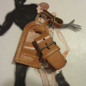 Louis Vuitton luggage tag black Golden Leather ref.359739 - Joli