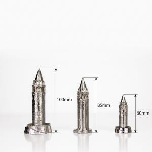 Three Galata Tower miniatures with height markings of 100 mm, 85 mm and 60 mm on a white background