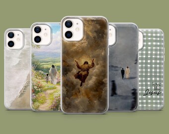 May include: A collection of phone cases with various religious-themed designs. The cases feature images of Jesus, landscapes, and inspirational text. The cases are in clear protective covers, showcasing the artwork. The cases are arranged in a row against a green background.