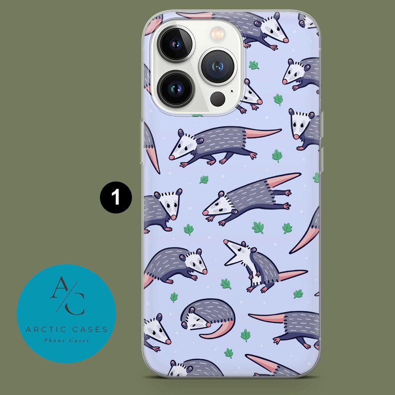 May include: A clear phone case with a light blue background and a repeating pattern of cartoon opossums. The opossums are in various poses, some are curled up, some are standing on their hind legs, and some are walking. The case has a white border and a clear back.