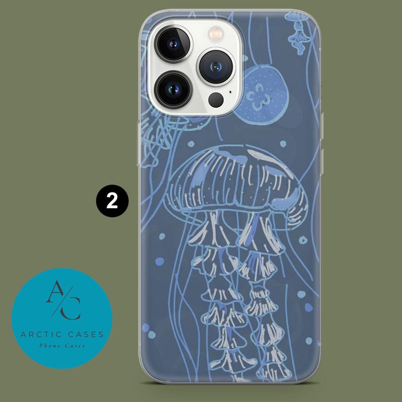 May include: A clear phone case with a blue and white jellyfish design. The case has a raised camera bump with three lenses.
