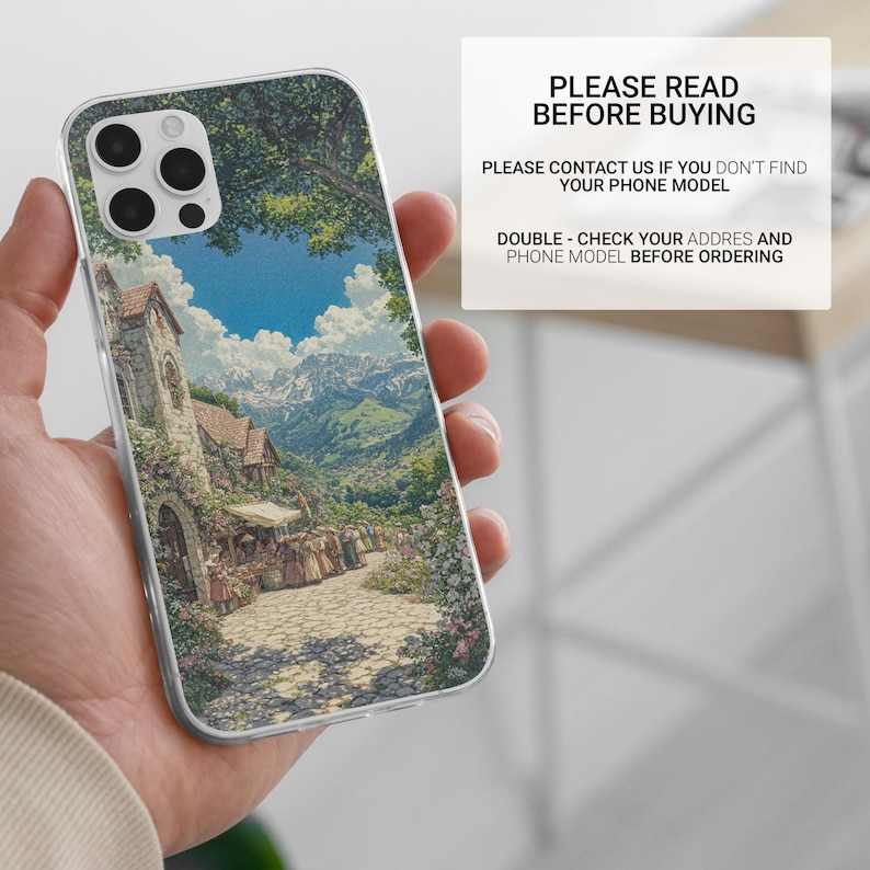 May include: Clear phone case featuring a scenic landscape painting of a European village with a church, mountains, and blue sky. The case has the text "PLEASE READ BEFORE BUYING".