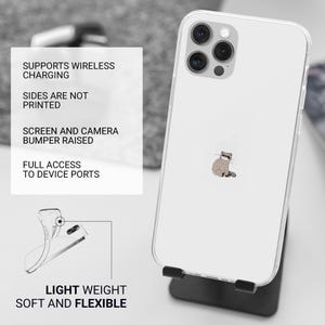 May include: A clear phone case with a cartoon raccoon design. The case is compatible with wireless charging and has raised edges to protect the screen and camera. The case is lightweight and flexible.