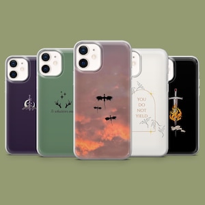 May include: Five phone cases with different designs. One shows a sunset with dragon silhouettes, another has the text "You Do Not Yield", and others display a sword, a crescent moon, and stars. Each case has a clear border.