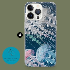 May include: A clear phone case with a design of jellyfish in shades of blue, pink, and white on a dark blue background.