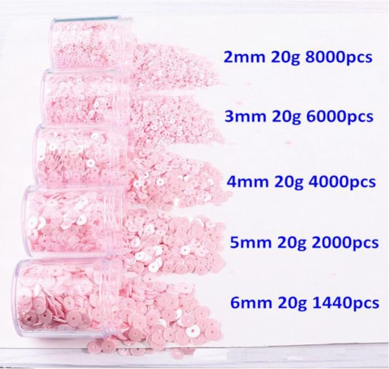May include: Five clear jars filled with pink sequins of varying sizes. The jars are labeled with the size, weight, and quantity of the sequins: 2mm 20g 8000pcs, 3mm 20g 6000pcs, 4mm 20g 4000pcs, 5mm 20g 2000pcs, and 6mm 20g 1440pcs.