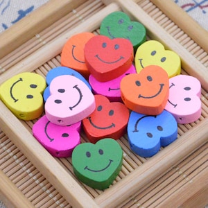 50pcs assorted color wooden hearts, smiling face painted wooden hearts, heart shape wooden beads