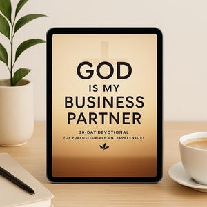 May include: A tablet computer displaying a digital book cover with the title "God is My Business Partner: 30-Day Devotional for Purpose-Driven Entrepreneurs". The cover features a cross and a brown gradient background.