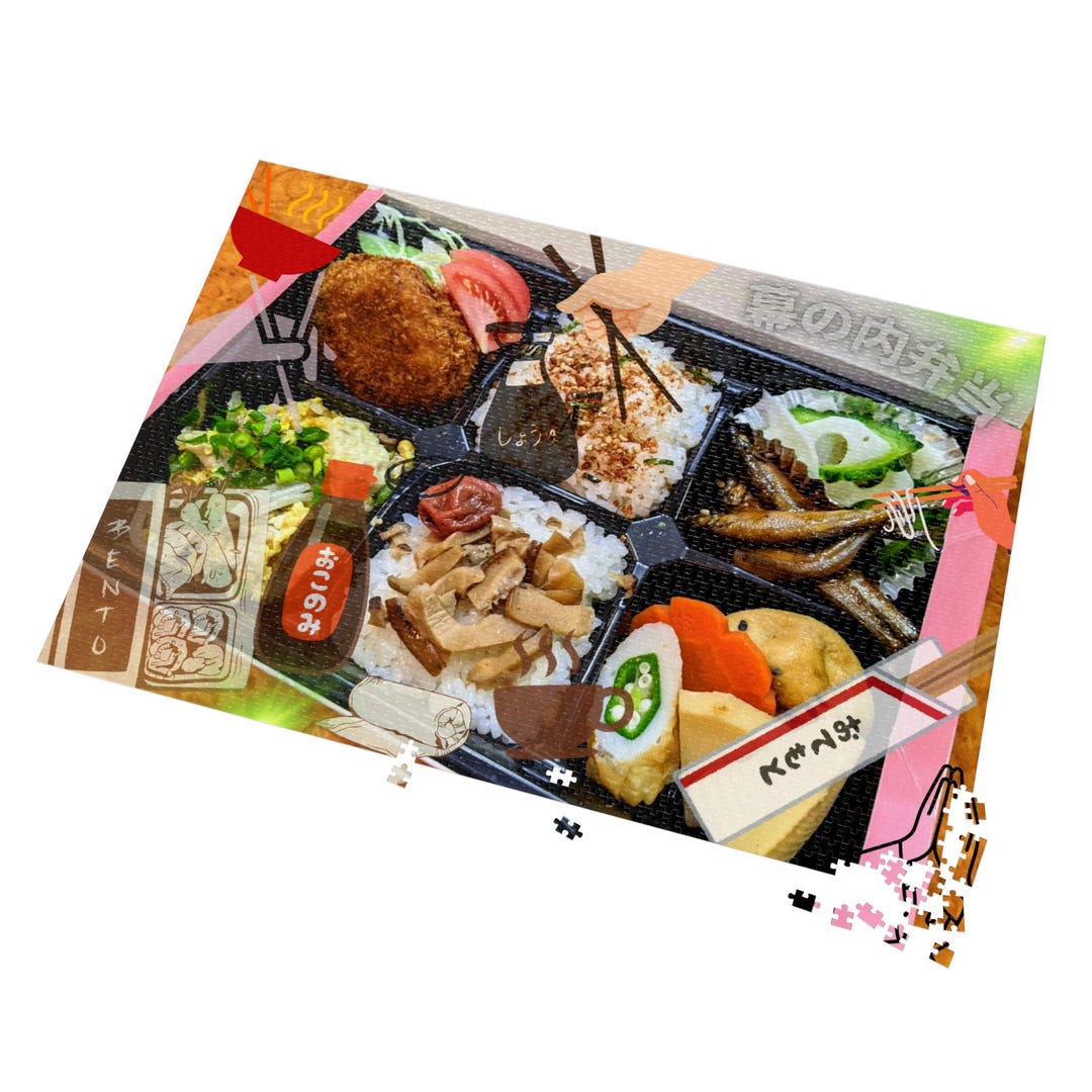 幕の内弁当は、日本の伝統的な弁当箱で、通常はご飯と様々なおかずが