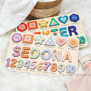May include: A wooden puzzle with colorful shapes and numbers. The puzzle includes a circle, square, star, triangle, heart, hexagon, and ten. The puzzle also includes the letters S, E, D, O, N, A, 1, 2, 3, 4, 5, 6, 7, 8, 9, and 10.
