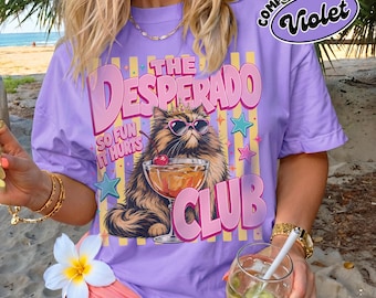 Princess Donut Desperado Club Shirt, DCC Cat Graphic Tee, Dungeon Crawler Inspired Shirt, Funny Bookish Cat Lover Gift.