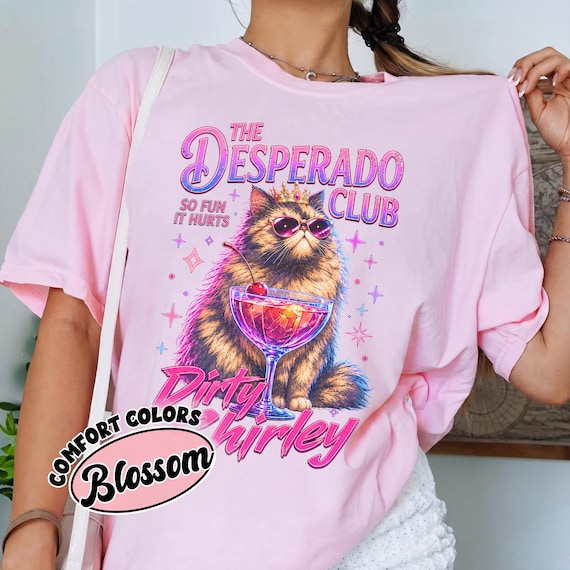 Princess Donut Desperado Club Shirt, DCC Dirty Shirley Cat Tee, Dungeon Crawler Inspired Graphic Shirt, Funny Bookish Cat Lover Gift.