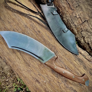 Beautiful handmade machete knife crafted with high-carbon steel and finished with a durable handle. Ideal as a gift for your father or husband on special occasions like birthdays or Father’s Day. Strong, sharp, and practical for camping, chopping, or bushcraft use. A lasting tool and memorable gift.