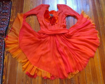 marilyn monroe orange dress designer