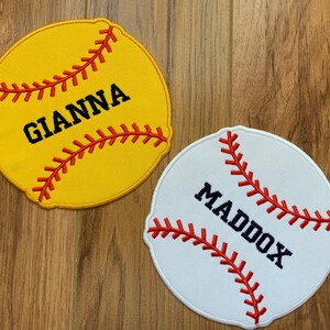 May include: Two embroidered baseball patches, one yellow with the name "Gianna" and one white with the name "Maddox".