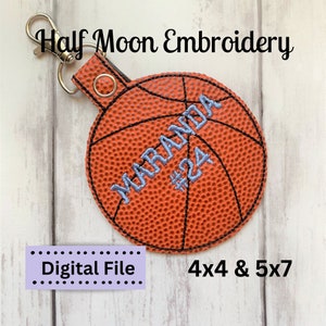 May include: Orange and black basketball-shaped keychain with the name "MIRANDA #24" embroidered in blue. Digital file for 4x4 and 5x7 hoop sizes.