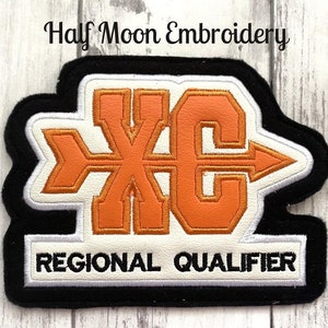 May include: Orange and white embroidered patch with the text "XC" and "REGIONAL QUALIFIER".