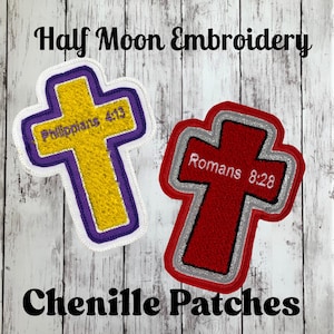 May include: Two cross-shaped chenille patches. The left patch is yellow with a purple border and the text Philippians 4:13. The right patch is red with a silver border and the text Romans 8:28. The text Half Moon Embroidery Chenille Patches is visible.