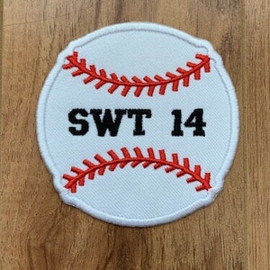 May include: White baseball-shaped patch with red stitching and the text "SWT 14" in black.