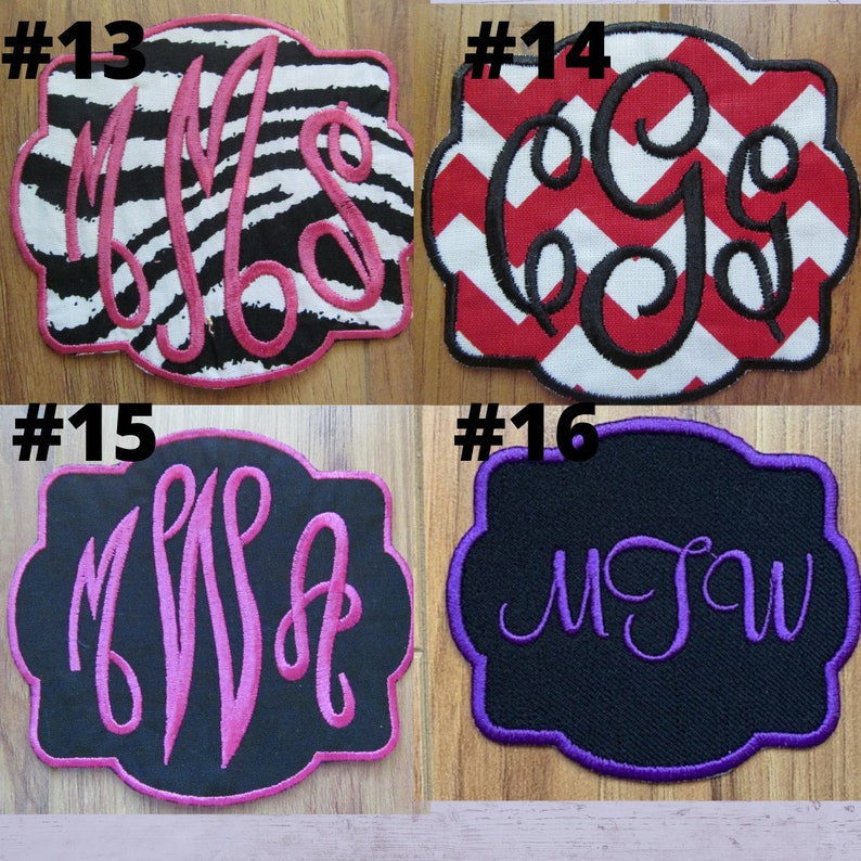 May include: Four embroidered patches with different monogram designs. One has a zebra print background with pink letters, another has a red and white chevron pattern with black letters. The other two have black backgrounds with pink and purple letters.