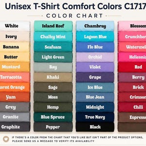 May include: A color chart for Unisex T-Shirt Comfort Colors C1717 displaying four vertical columns of folded fabric swatches. Each swatch is labeled with its specific color name, ranging from white, yellow, and orange to green, blue, purple, pink, red, and brown tones.