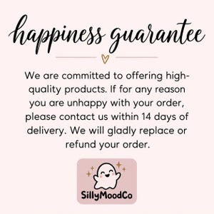 May include: A light pink informational graphic with the black cursive text happiness guarantee above a small gold heart. Below is black text stating a commitment to high-quality products, a 14-day contact policy, and a logo with a white ghost and SillyMoodCo.