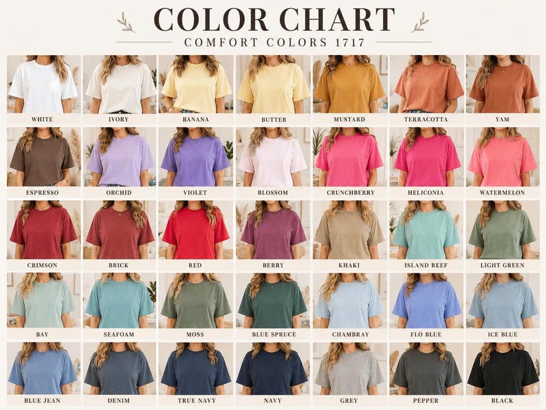 May include: A color chart for Comfort Colors 1717 t-shirts, displaying a grid of 35 short-sleeve shirts in various solid colors. Each shirt is labeled with its specific color name, ranging from white, ivory, and yellow tones to pinks, reds, greens, blues, grays, and black.
