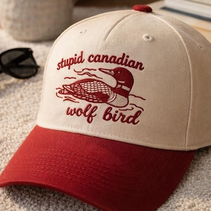 May include: A handmade wooden sign with the text "Welcome to our home" in a handwritten style. The sign is painted white with black lettering and a distressed finish, perfect for home decor.