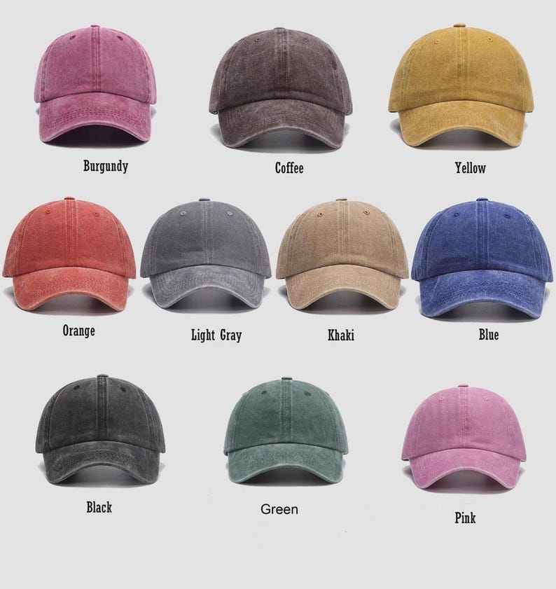 May include: A collection of ten baseball caps in various colors, including burgundy, coffee, yellow, orange, light gray, khaki, blue, black, green, and pink. Each cap has a curved brim and a fabric strap closure.