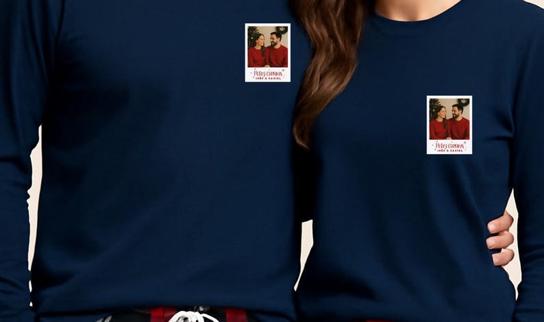 May include: Navy blue long-sleeve shirts with a small photo patch on the chest. The photo patch has a couple in red sweaters and the text "Happy Christmas" and "Love & Family".