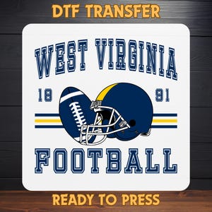 May include: White square DTF transfer with a West Virginia football theme. Features a navy blue football and helmet with yellow accents. Includes the text "WEST VIRGINIA FOOTBALL" and the years "18" and "91". The words "DTF TRANSFER" and "READY TO PRESS" are also included.