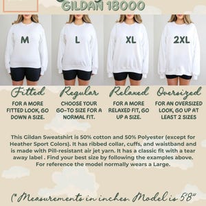 Gildan 18000 crewneck sweatshirt fit guide showing fitted, regular, relaxed, and oversized fits on a female model, with descriptions and cloud-themed background.
