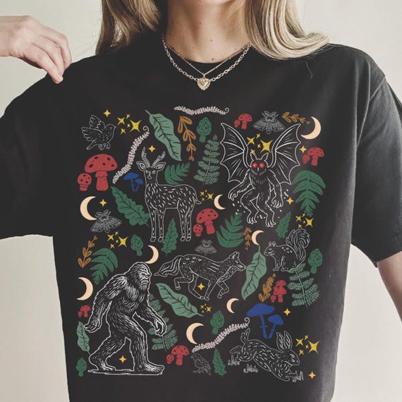 Forest Friends Cryptid Shirt: Linocut Woodland Mothman Bigfoot T-Shirt, Cottagecore Forestcore Graphic Tee, Folklore Shirt for Cryptid Lover